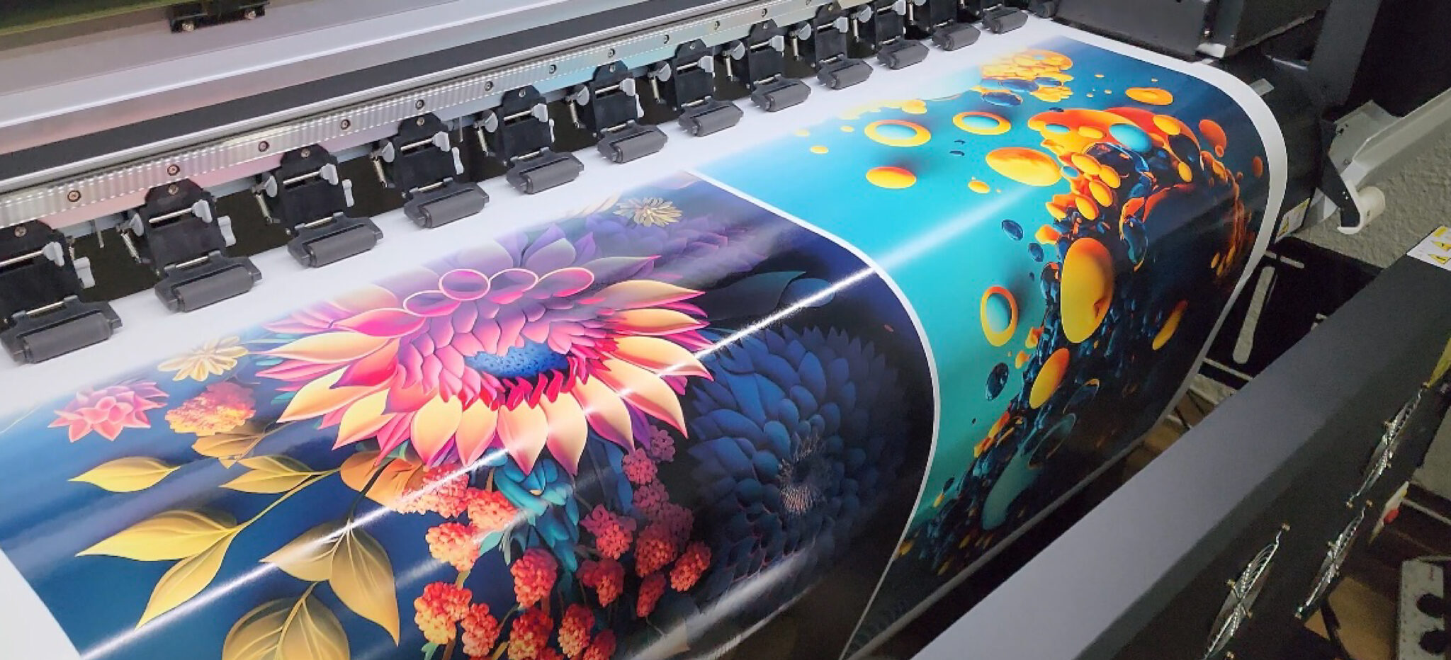 Large format printing production showcasing high-quality banners and signage for indoor and outdoor branding displays in UAE.